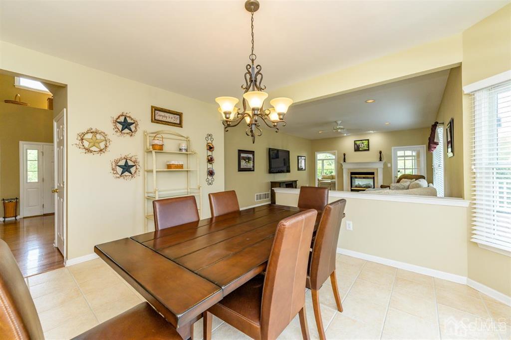 55 Rues Road Cream Ridge, NJ 08514 - Photo 18 of 67 a view of a dining room with furniture and wooden floor