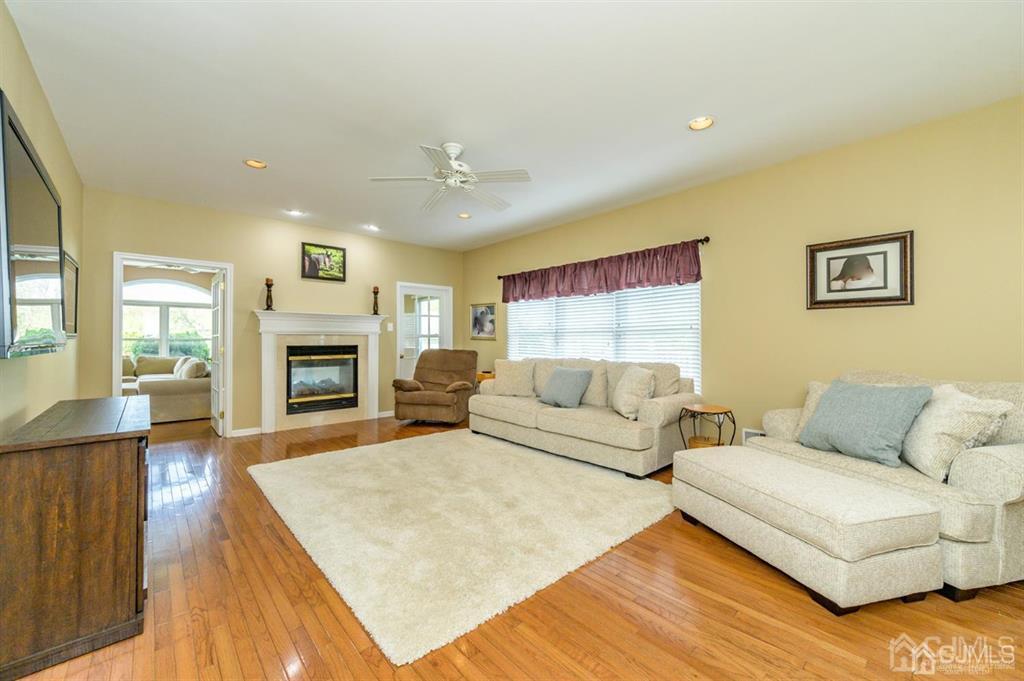 55 Rues Road Cream Ridge, NJ 08514 - Photo 20 of 67 a living room with furniture and a fireplace