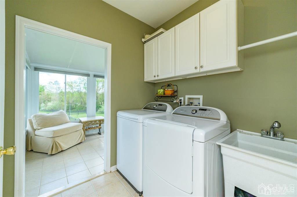 55 Rues Road Cream Ridge, NJ 08514 - Photo 22 of 67 a utility room with dryer and washer