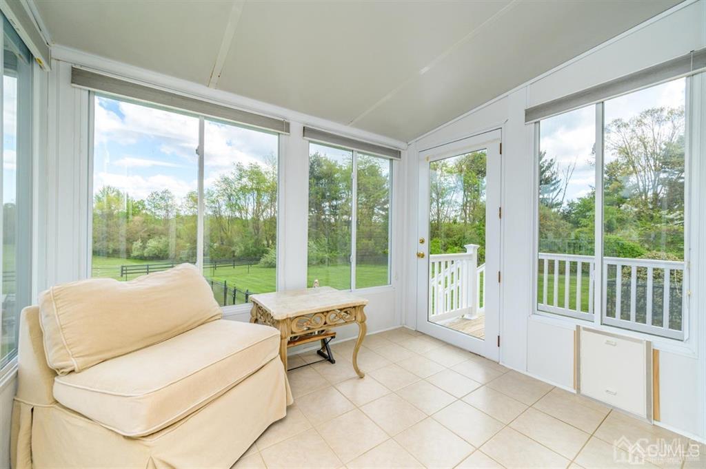 55 Rues Road Cream Ridge, NJ 08514 - Photo 23 of 67 a living room with furniture and a large window