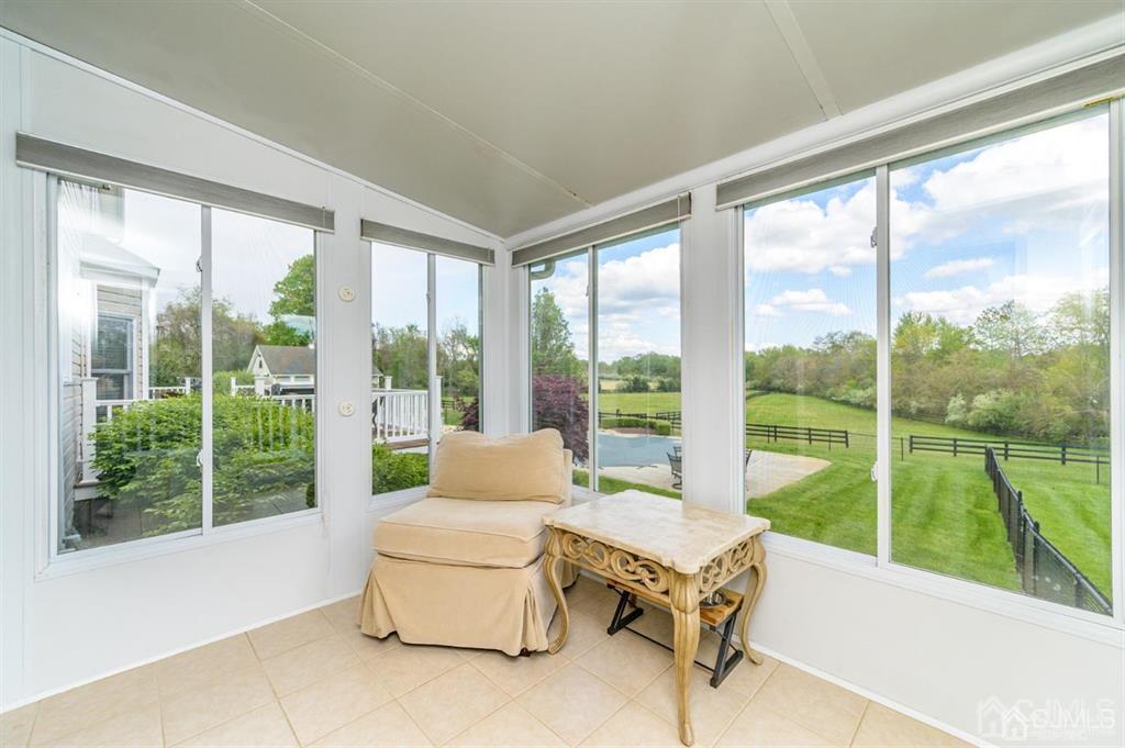 55 Rues Road Cream Ridge, NJ 08514 - Photo 24 of 67 a living room with furniture and floor to ceiling windows
