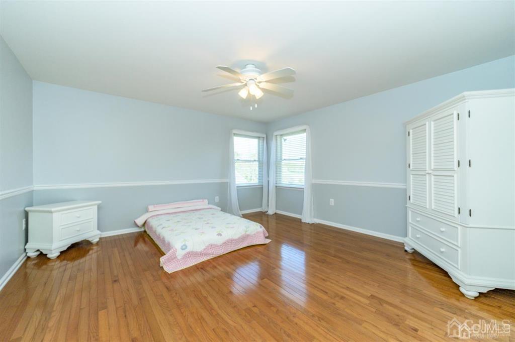 55 Rues Road Cream Ridge, NJ 08514 - Photo 38 of 67 wooden floor in an empty room with a window