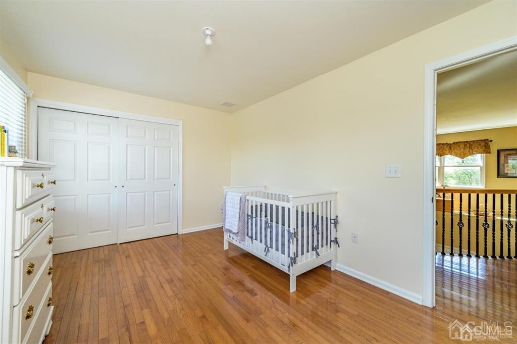 55 Rues Road Cream Ridge, NJ 08514 - Photo 43 of 67 a view of livingroom with hallway and wooden floor