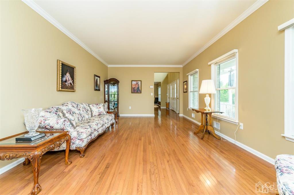 55 Rues Road Cream Ridge, NJ 08514 - Photo 6 of 67 a living room with furniture and a wooden floor