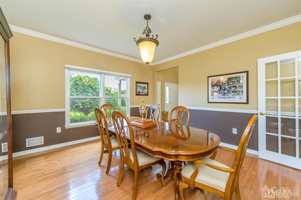 55 Rues Road Cream Ridge, NJ 08514 - Photo 10 of 67 a view of a dining room with furniture window and wooden floor