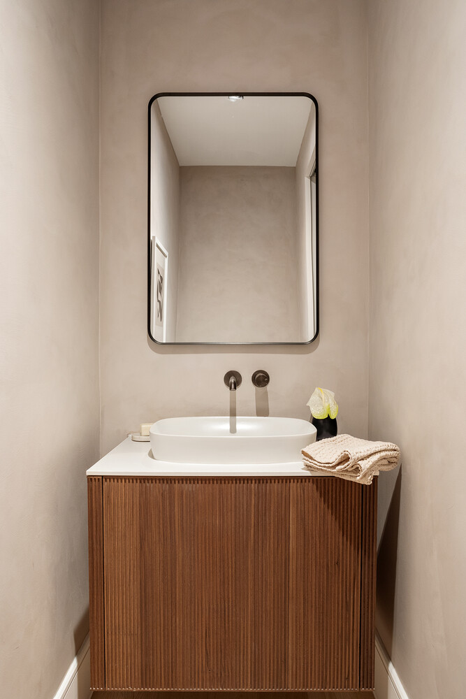 28 Herbert Street, Unit B4 Brooklyn, NY 11222 - Photo 14 of 17 a bathroom with a sink vanity and a mirror