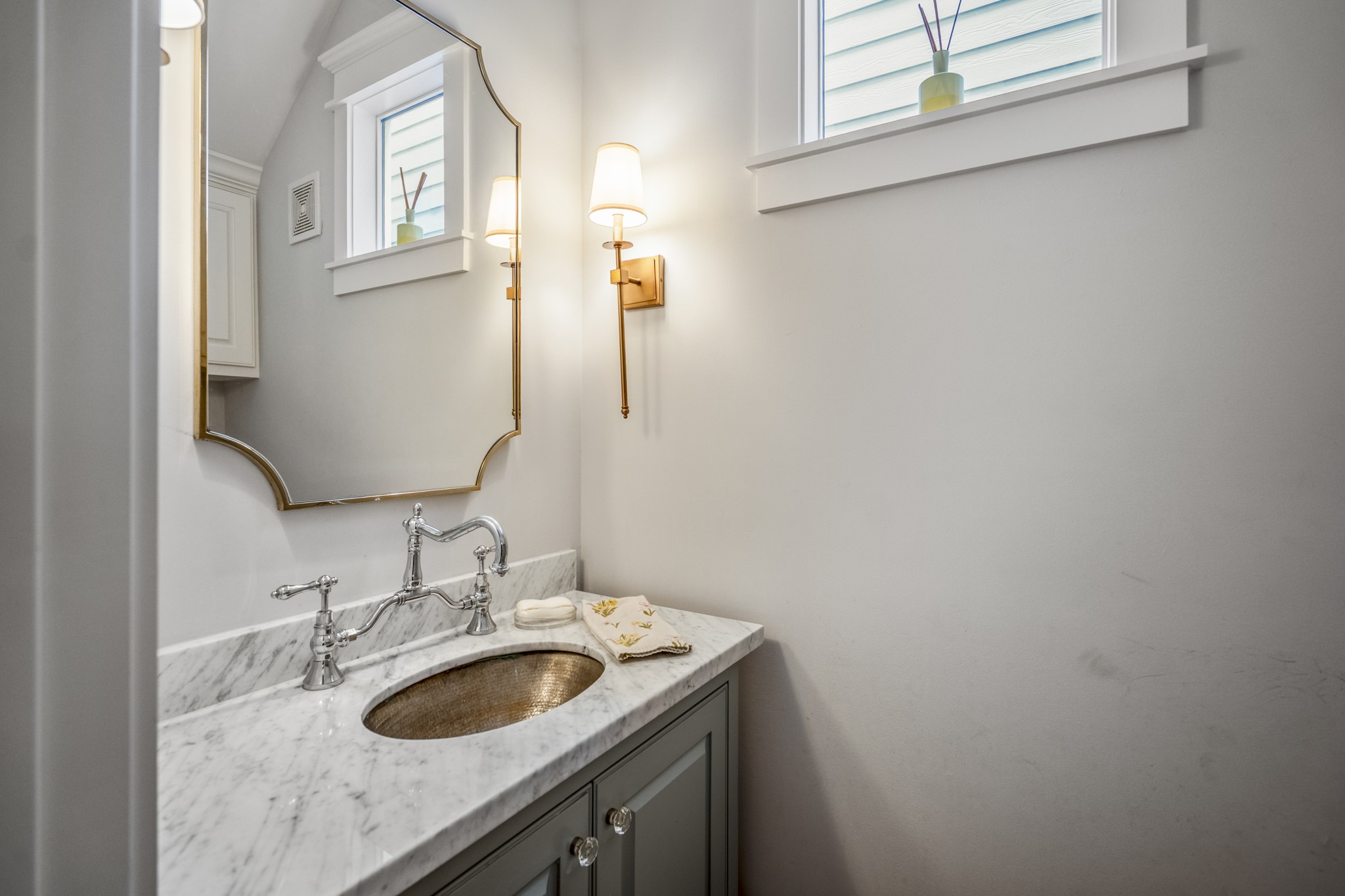 732 East 28th Street Houston, TX 77009 - Photo 12 of 44 a bathroom with a granite countertop sink and a mirror
