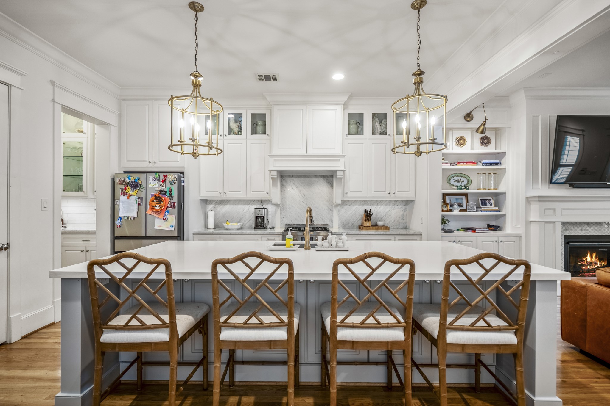 732 East 28th Street Houston, TX 77009 - Photo 13 of 44 a view of a dining room with furniture wooden floor and chandelier