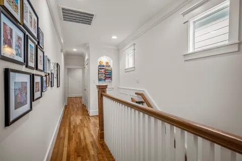 a view of a hallway with a window