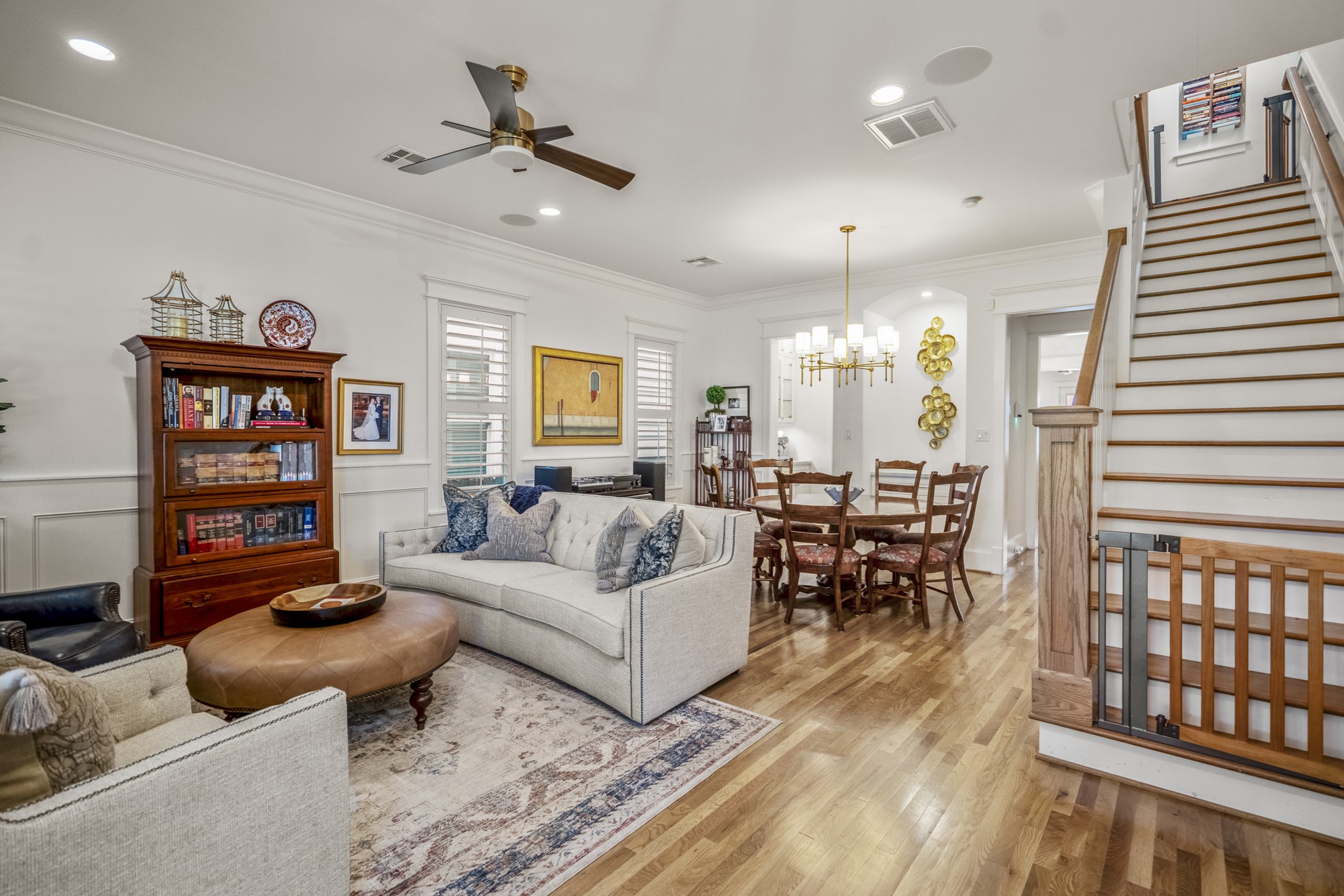 732 East 28th Street Houston, TX 77009 - Photo 8 of 44 a living room with furniture a chandelier and a dining table