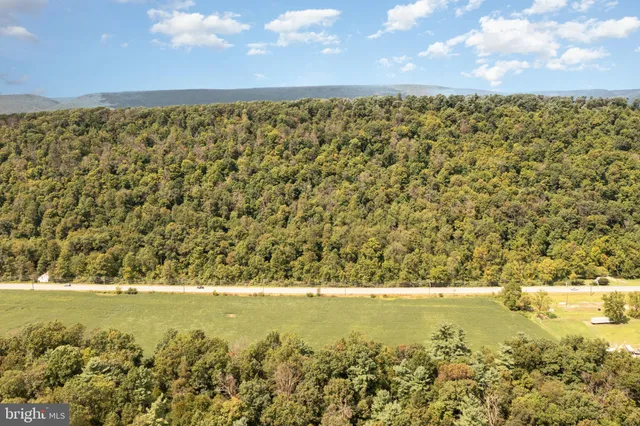 a view of an outdoor space and a mountain view