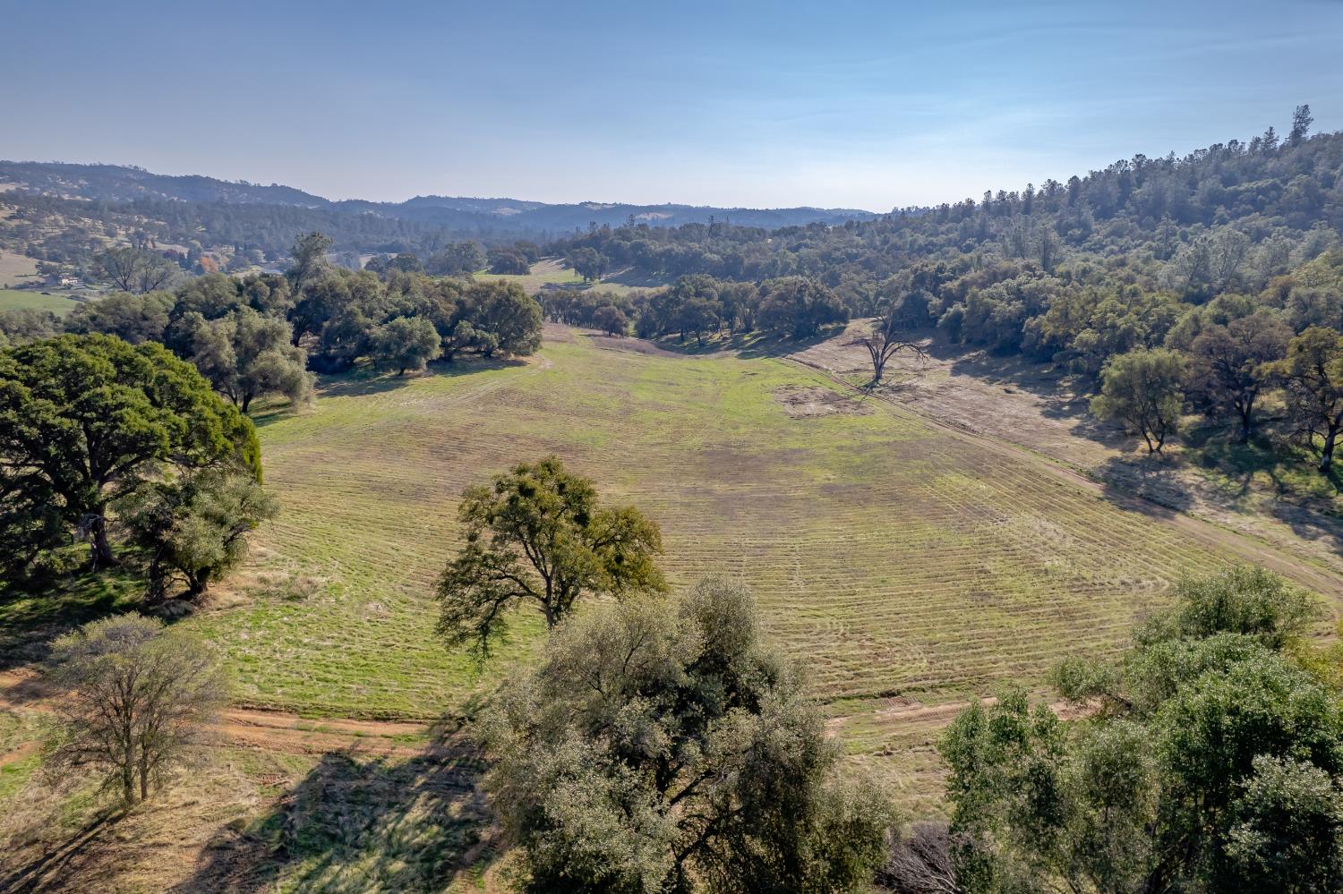 a view of a lake with mountains in the background