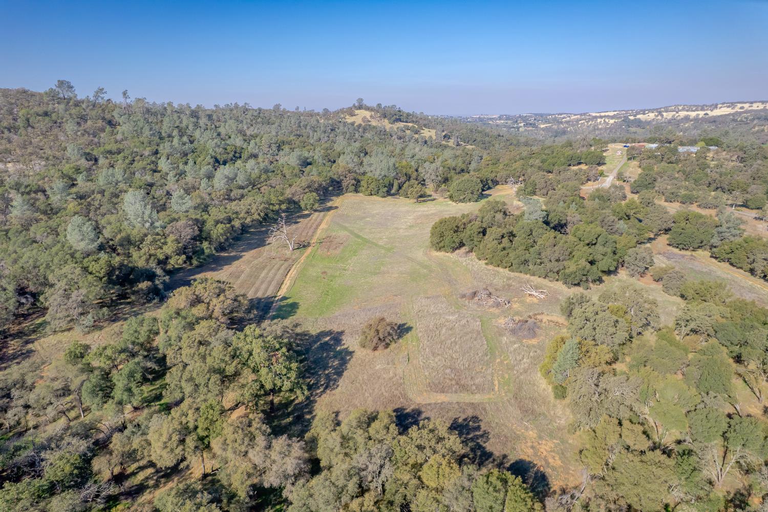5545 Garden Bar Road Lincoln, CA 95648 - Photo 25 of 32 a view of a field with a mountain in the background