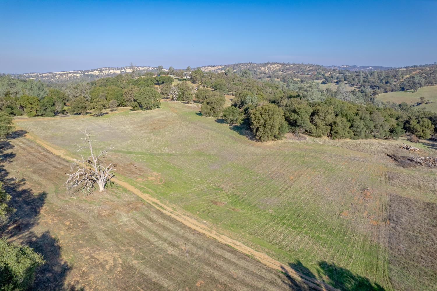 5545 Garden Bar Road Lincoln, CA 95648 - Photo 3 of 32 a view of a field with mountains in the background