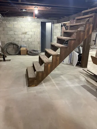 a view of an empty room with windows