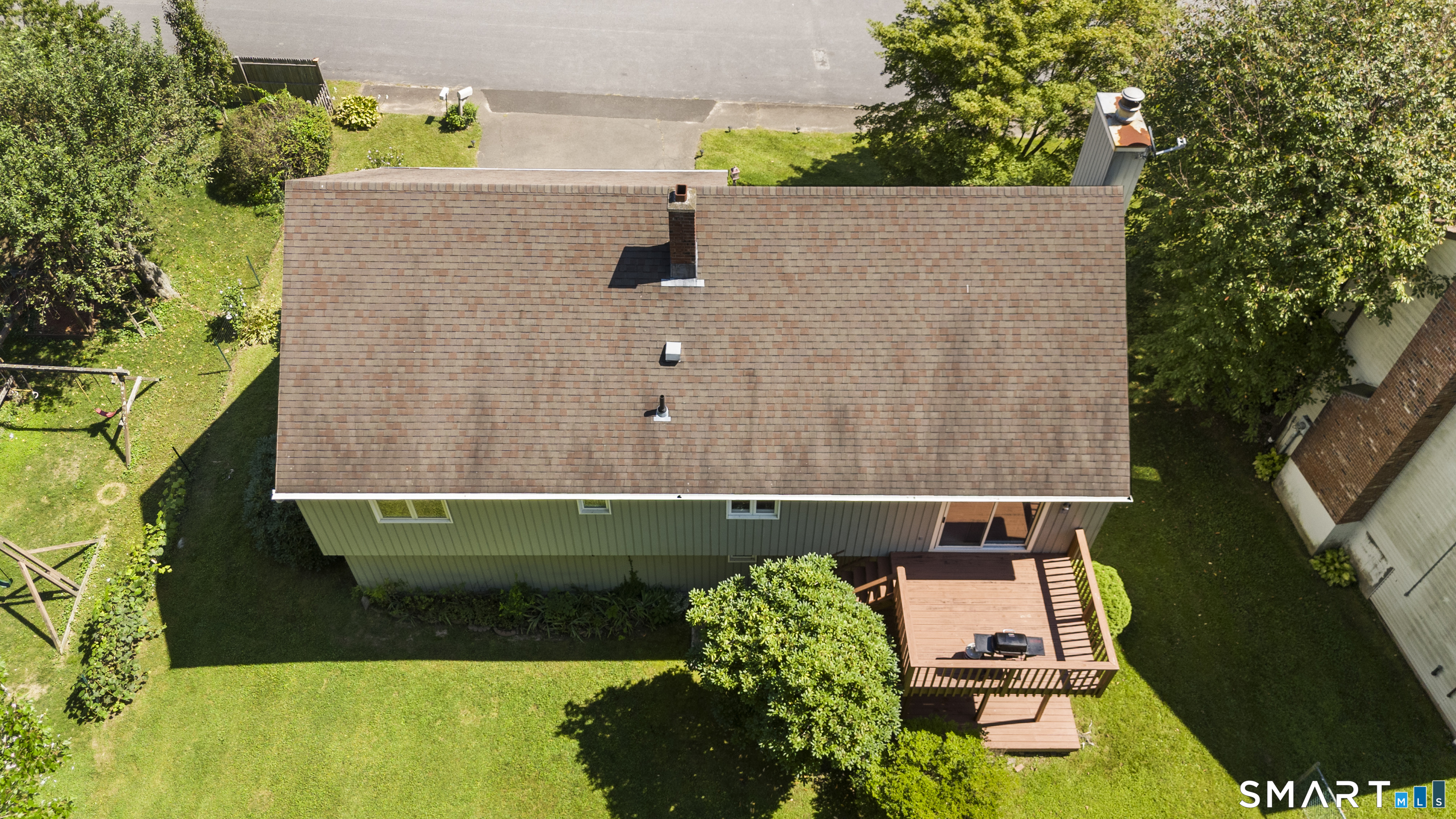 View of backyard and 2-tier deck