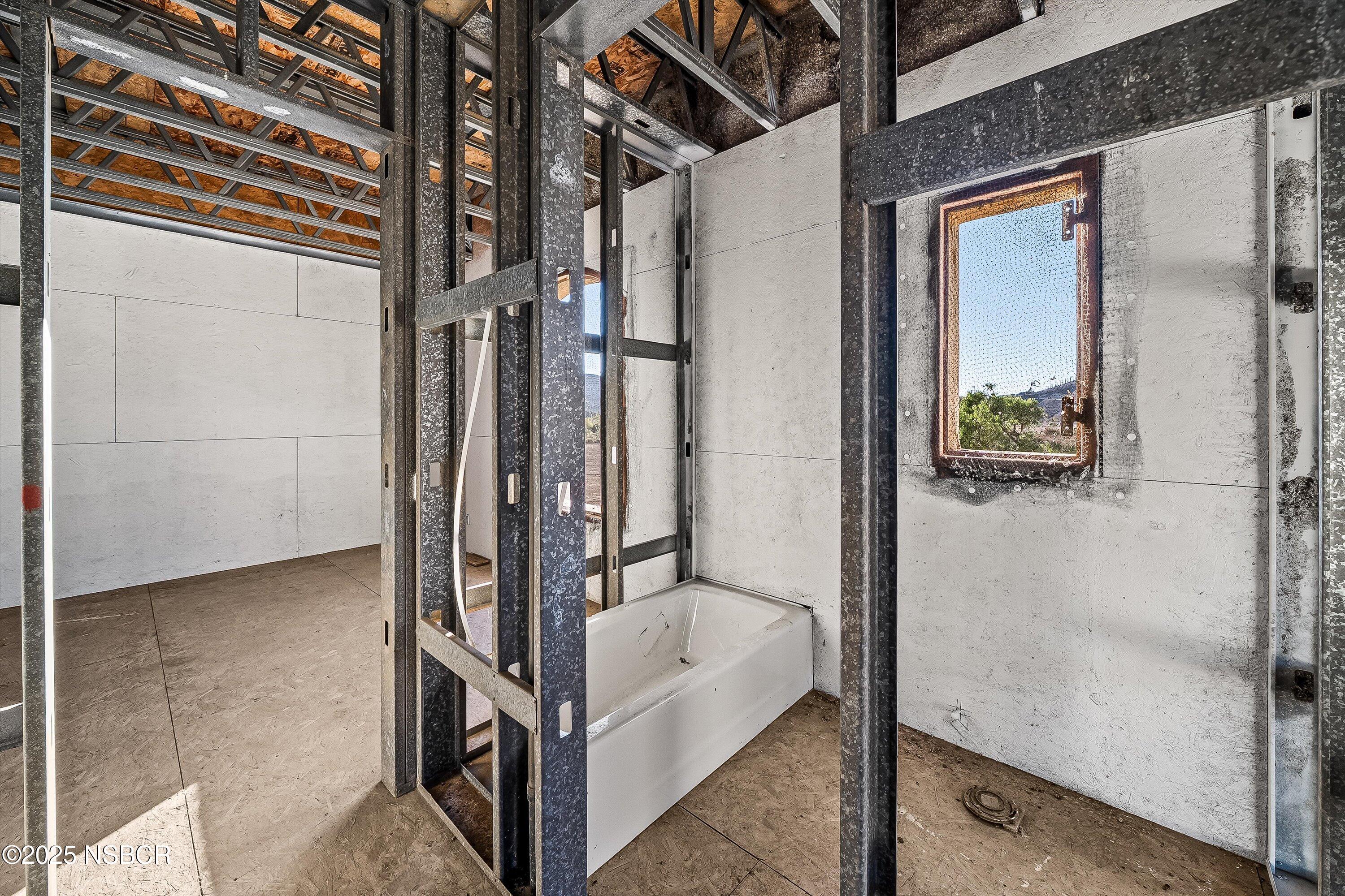 4375 Sweeney Road Lompoc, CA 93436 - Photo 36 of 70 a bathroom with a tub and shower