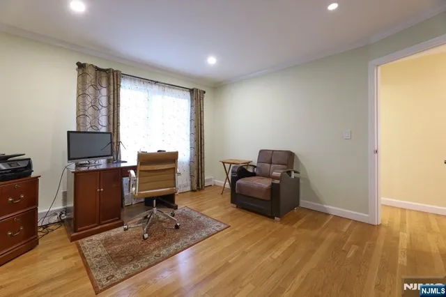 a bedroom with a workspace