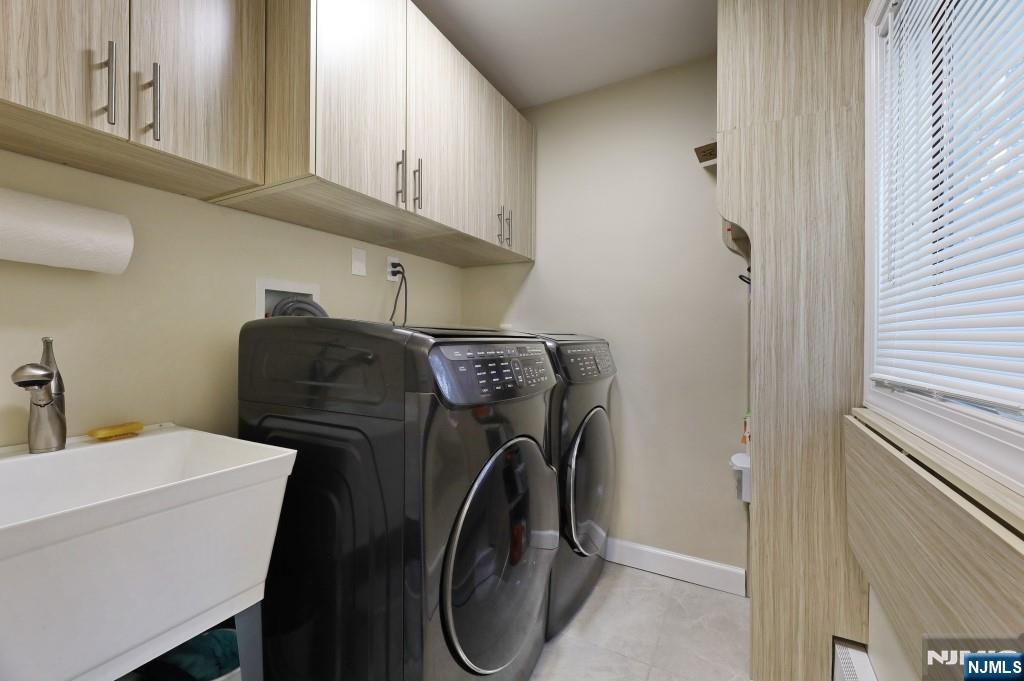 83 Hampshire Road Washington Township, NJ 07676 - Photo 25 of 40 a utility room with dryer and washer