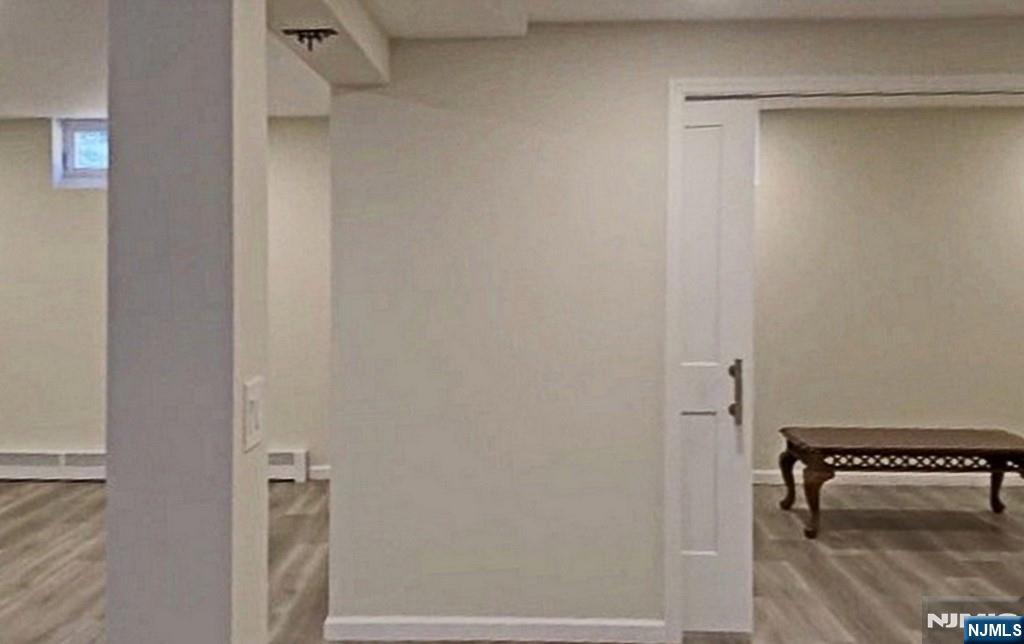 83 Hampshire Road Washington Township, NJ 07676 - Photo 7 of 40 a bathroom with a sink and a mirror