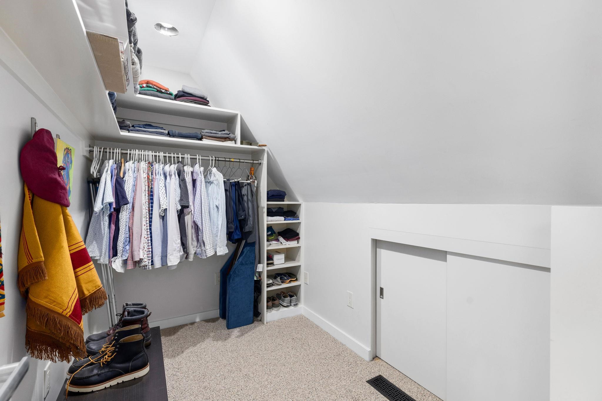 2204 Timberlake Drive Raleigh, NC 27604 - Photo 28 of 100 a view of walk in closet with clothes and shoes