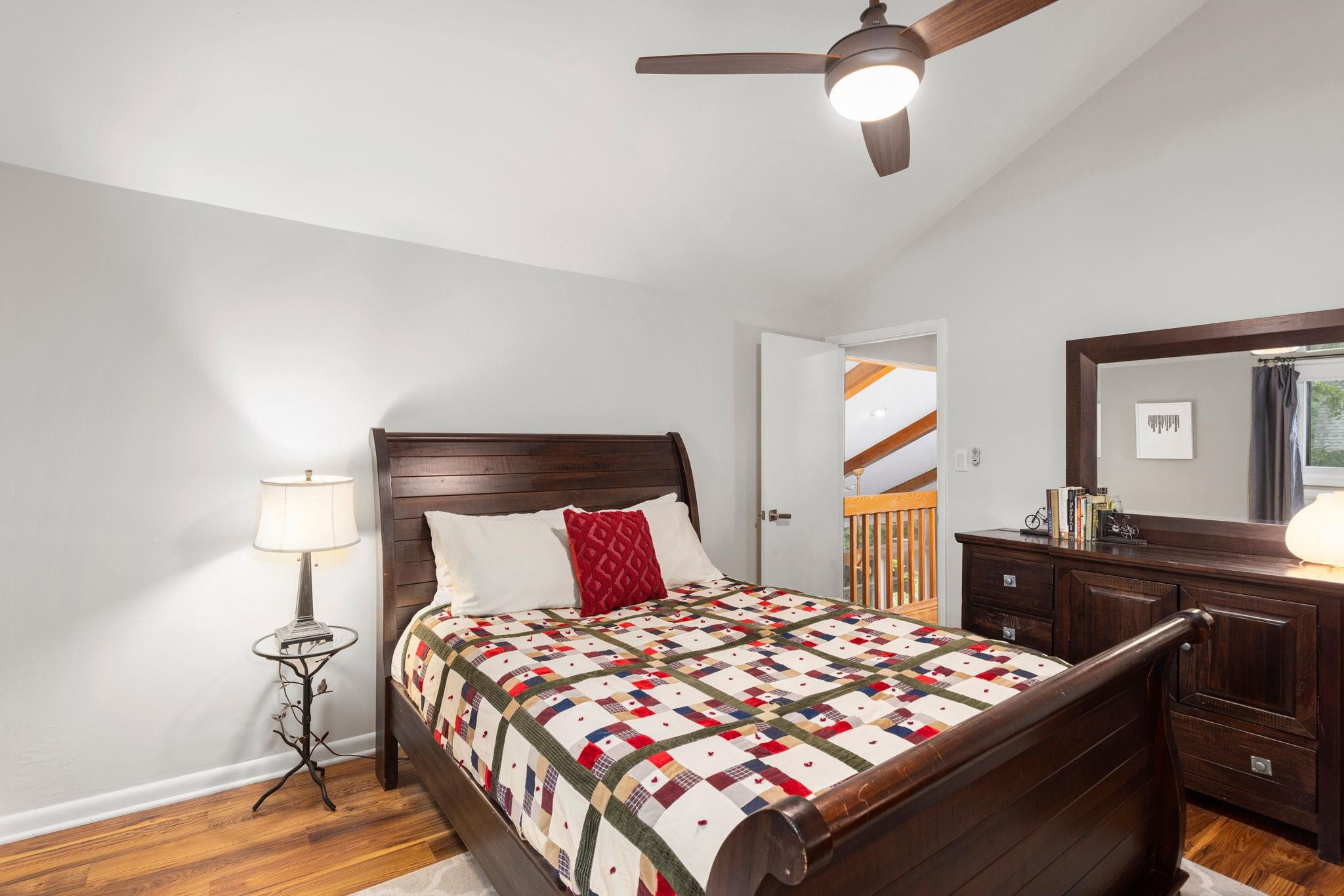 2204 Timberlake Drive Raleigh, NC 27604 - Photo 34 of 100 a bedroom with a bed and wooden floor