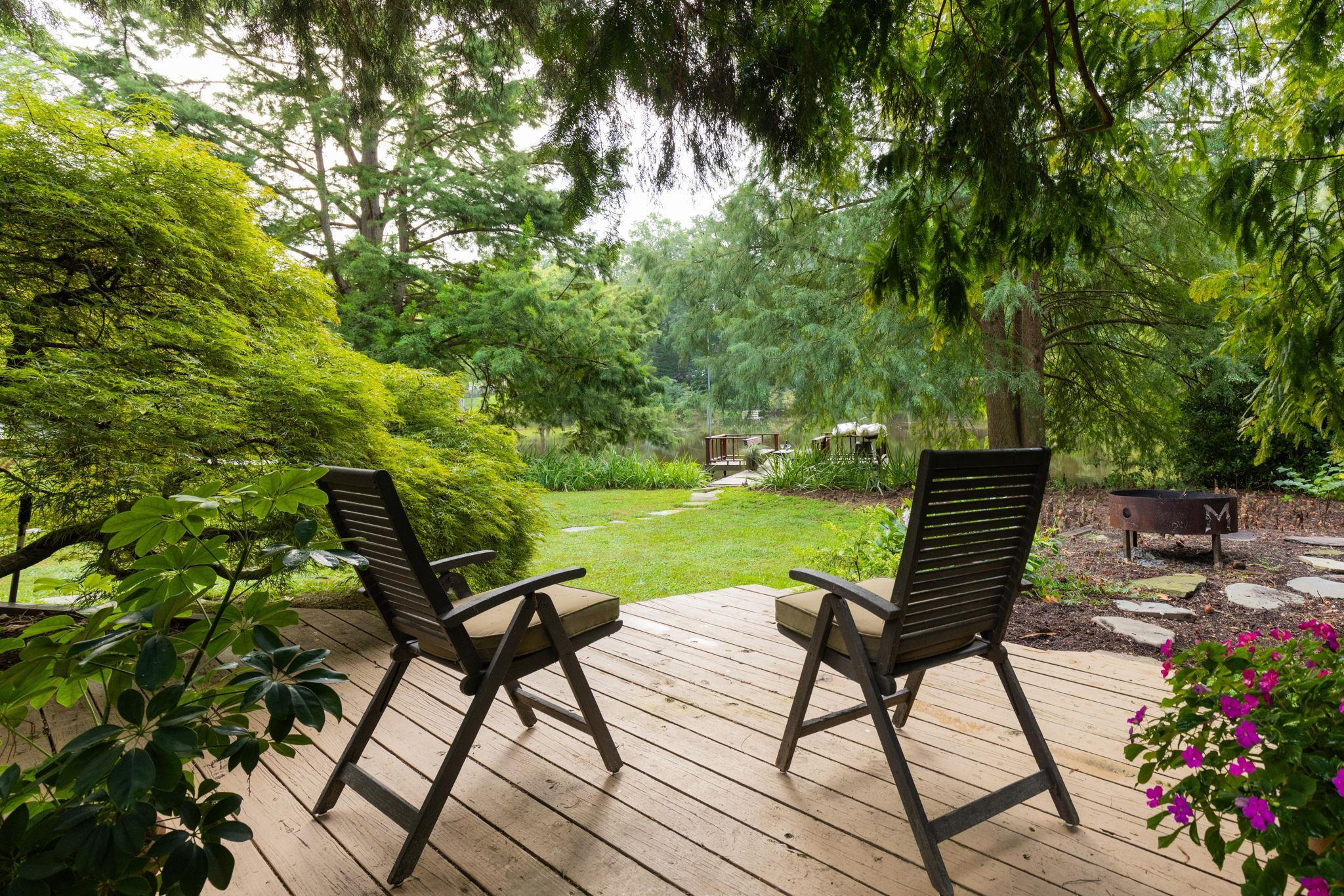 2204 Timberlake Drive Raleigh, NC 27604 - Photo 48 of 100 a view of a chairs and table in the garden