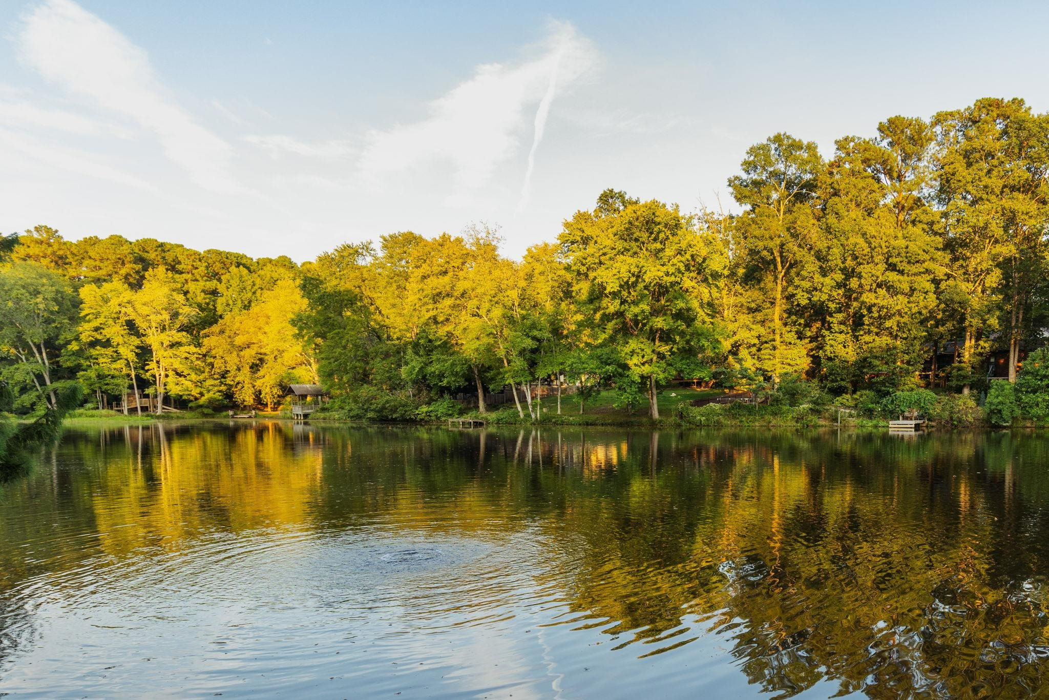 2204 Timberlake Drive Raleigh, NC 27604 - Photo 57 of 100 a view of a lake with a mountain in the background