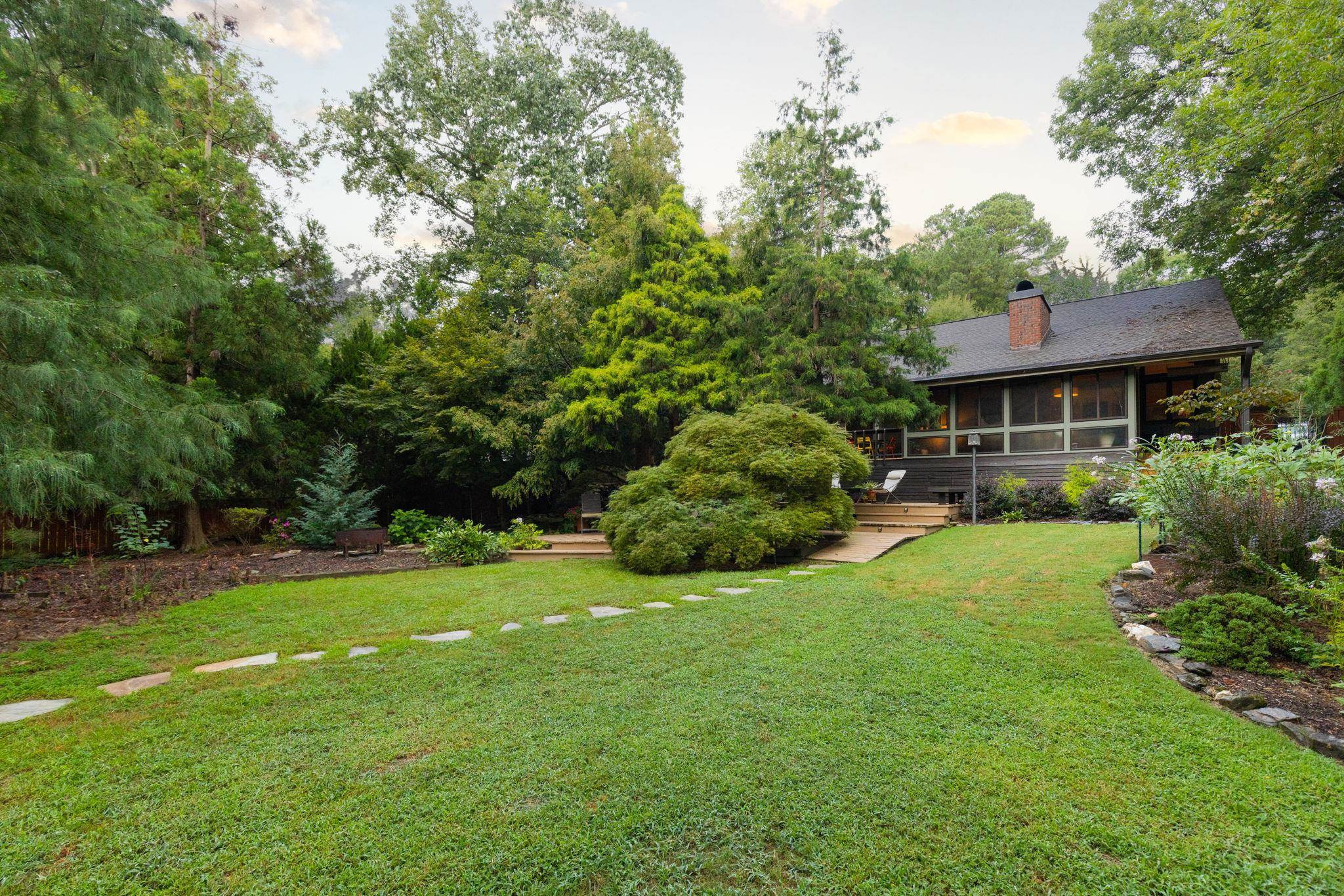 2204 Timberlake Drive Raleigh, NC 27604 - Photo 70 of 100 a front view of a house with a yard