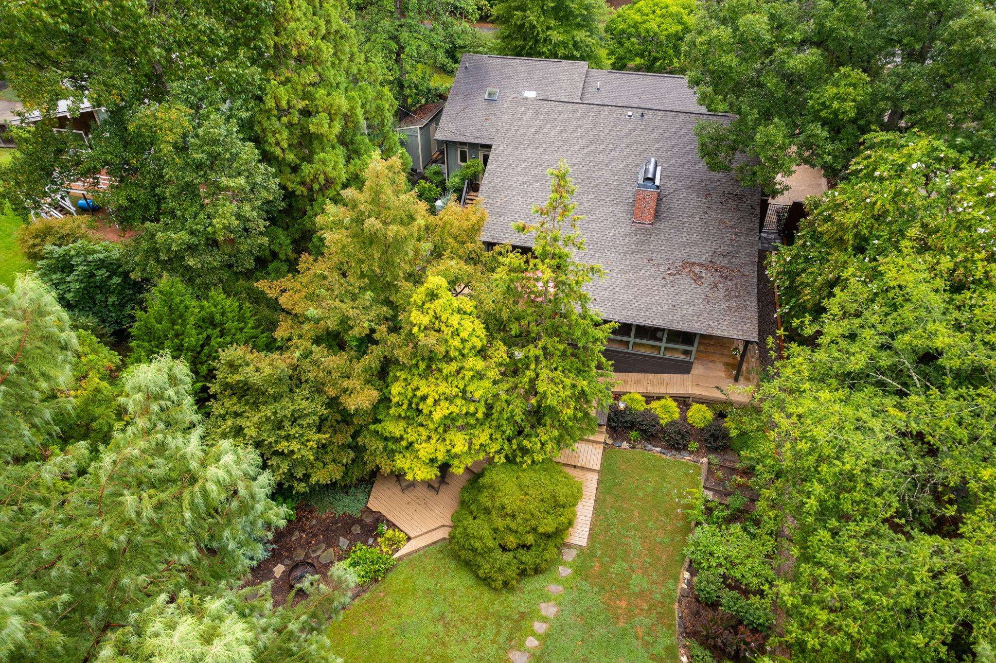 2204 Timberlake Drive Raleigh, NC 27604 - Photo 92 of 100 an aerial view of a house with a yard and garden