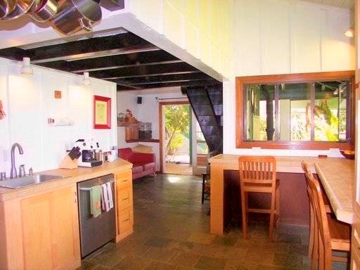 3198 Wawae Road Kalaheo, HI 96741 - Photo 3 of 30 a view of a dining table and chairs in the room