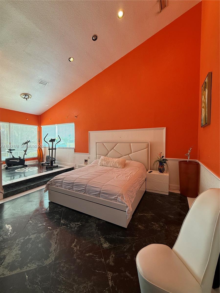 747 West 78th Street Hialeah, FL 33014 - Photo 15 of 37 a bedroom with a bed and window