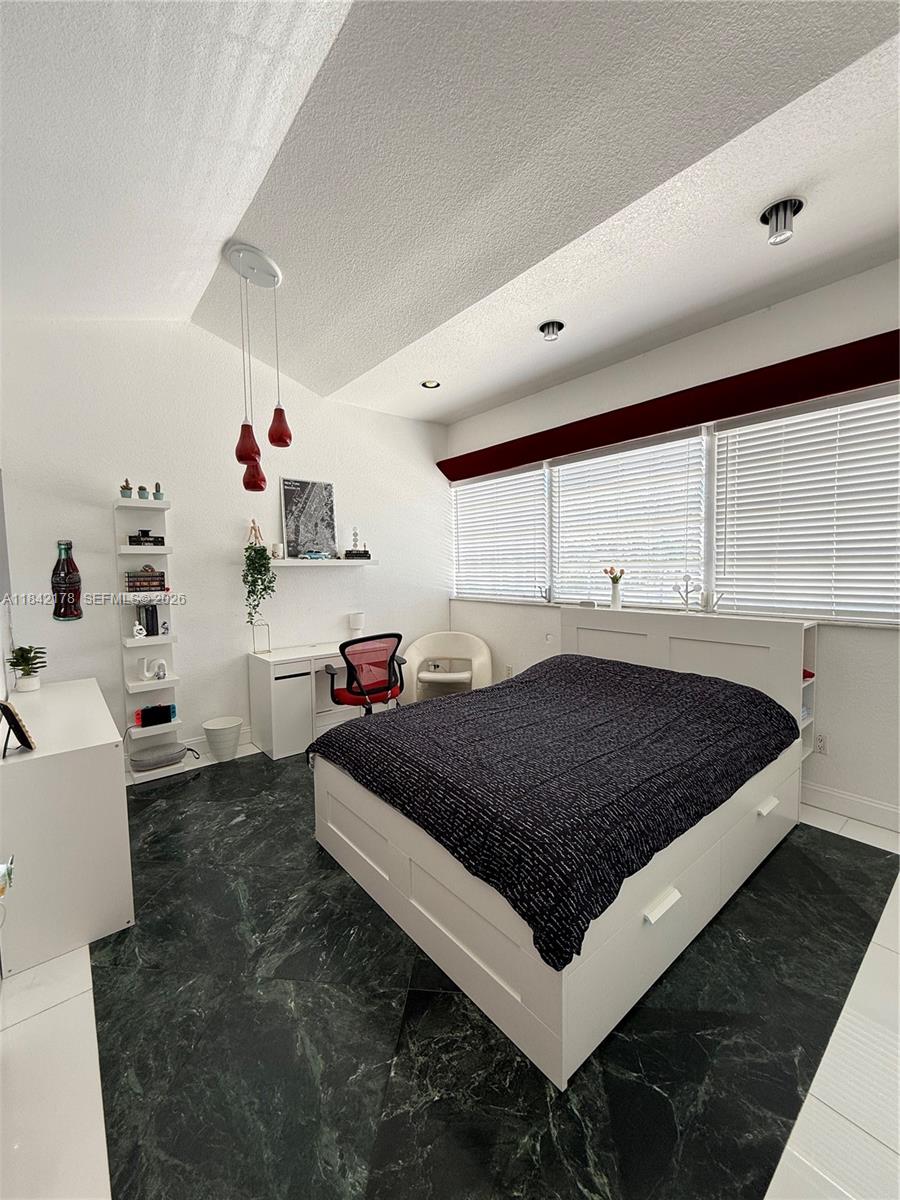 747 West 78th Street Hialeah, FL 33014 - Photo 21 of 37 a living room with furniture and a window