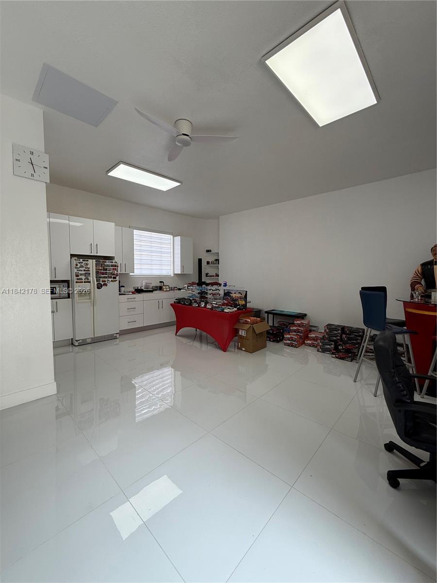 747 West 78th Street Hialeah, FL 33014 - Photo 30 of 37 a room with furniture and a gym machine