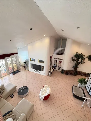 a room with furniture and a flat screen tv