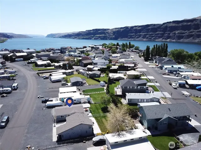 an aerial view of a house with outdoor space