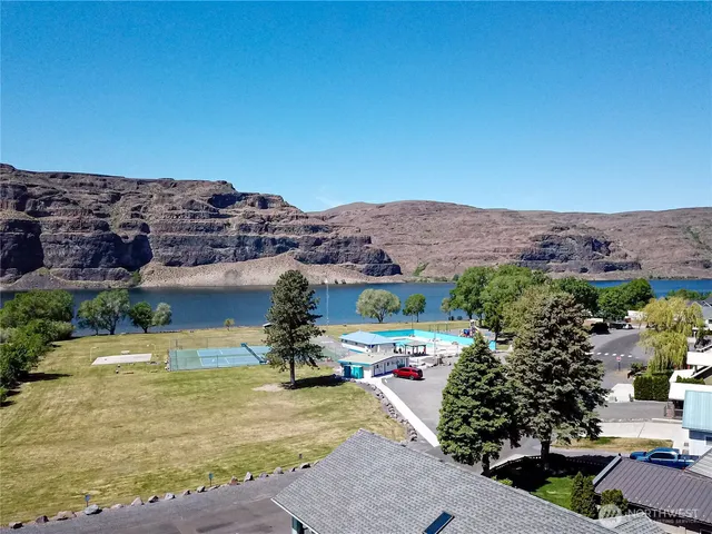 a view of a house with a ocean view