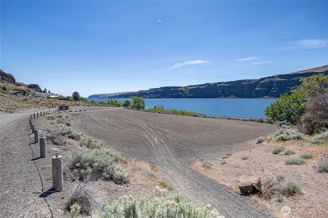a view of a road with an ocean view