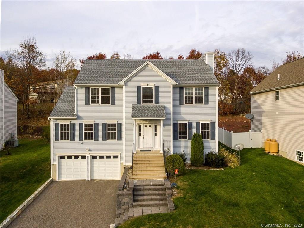 237 Ridgefield Avenue Waterbury, CT 06705 - Photo 1 of 1 a front view of a house with a yard