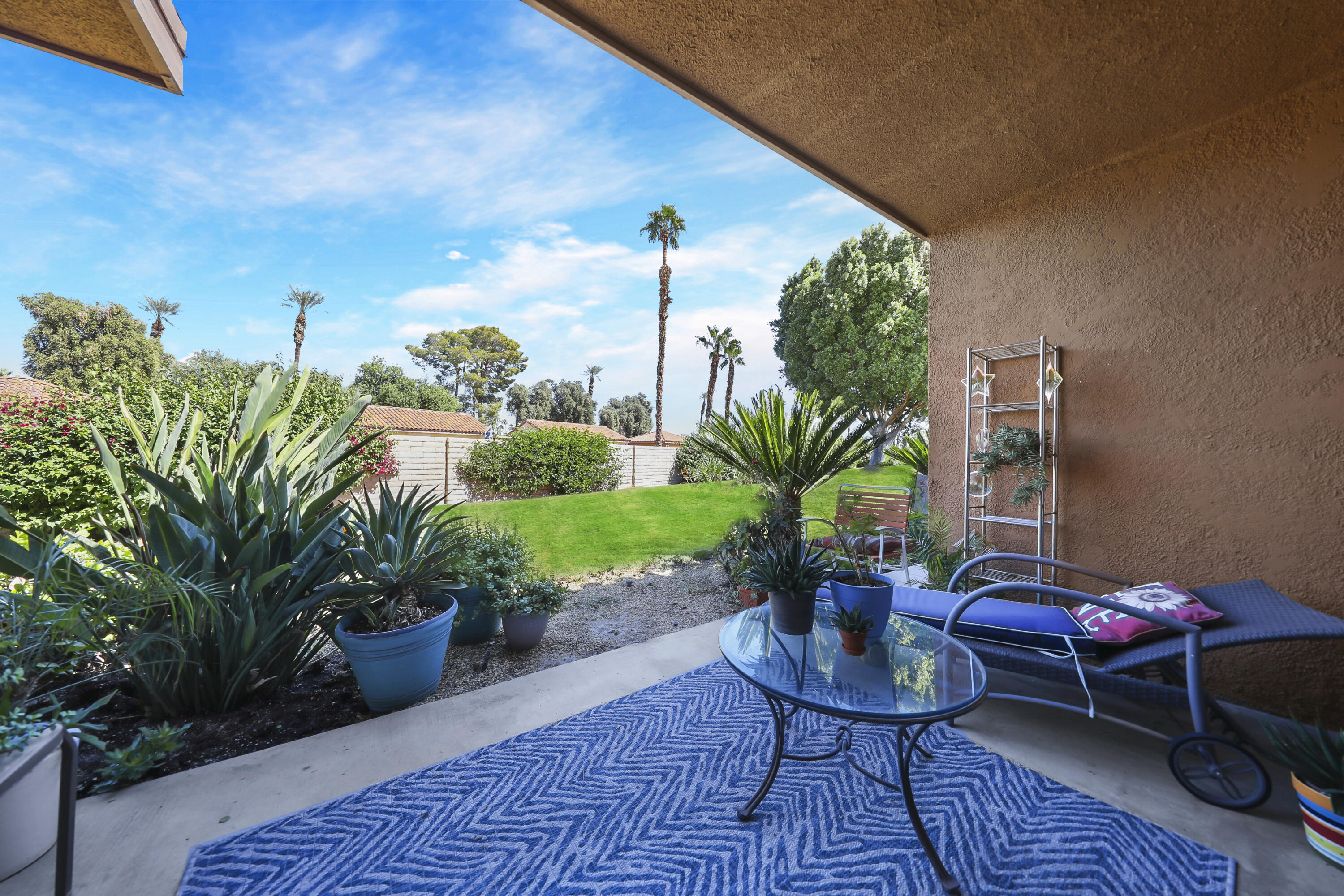 44 Malaga Drive Rancho Mirage, CA 92270 - Photo 14 of 22 a view of a porch with furniture and a potted plants