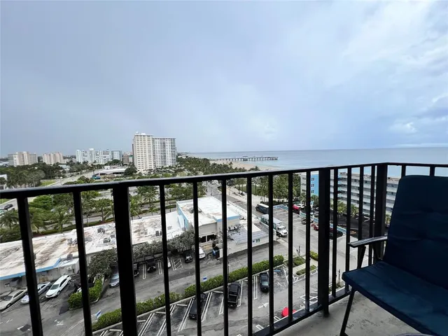 a balcony with outdoor seating