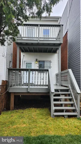 a view of a swimming pool with deck