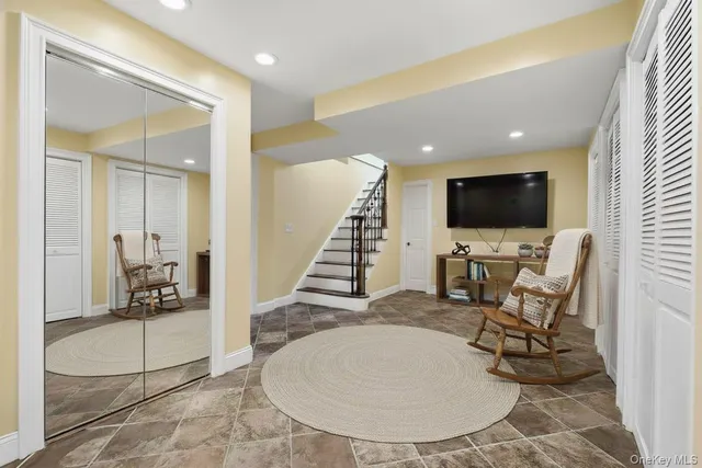 a view of a livingroom with furniture and a livingroom