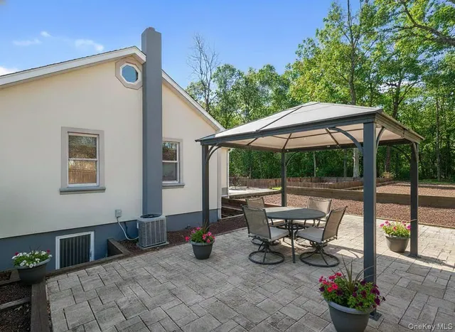 a view of outdoor space yard deck patio and outdoor kitchen