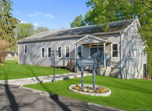 a house with garden in front of it