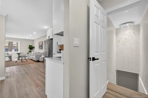 a view of a living room and hardwood floor