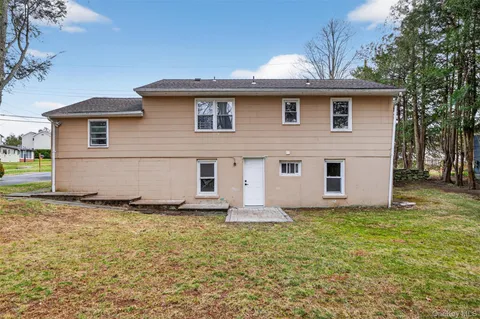 a front view of house with yard