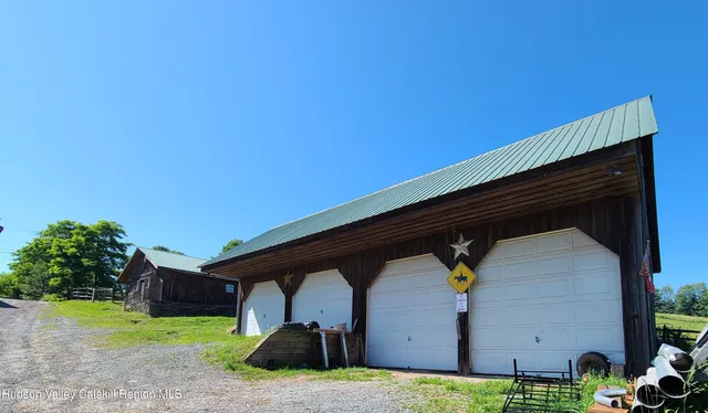 a view of a back yard of the house
