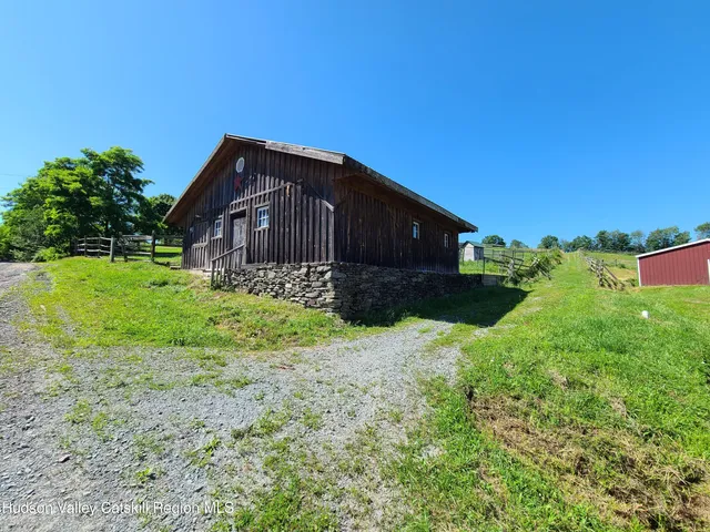 a view of a back yard of the house