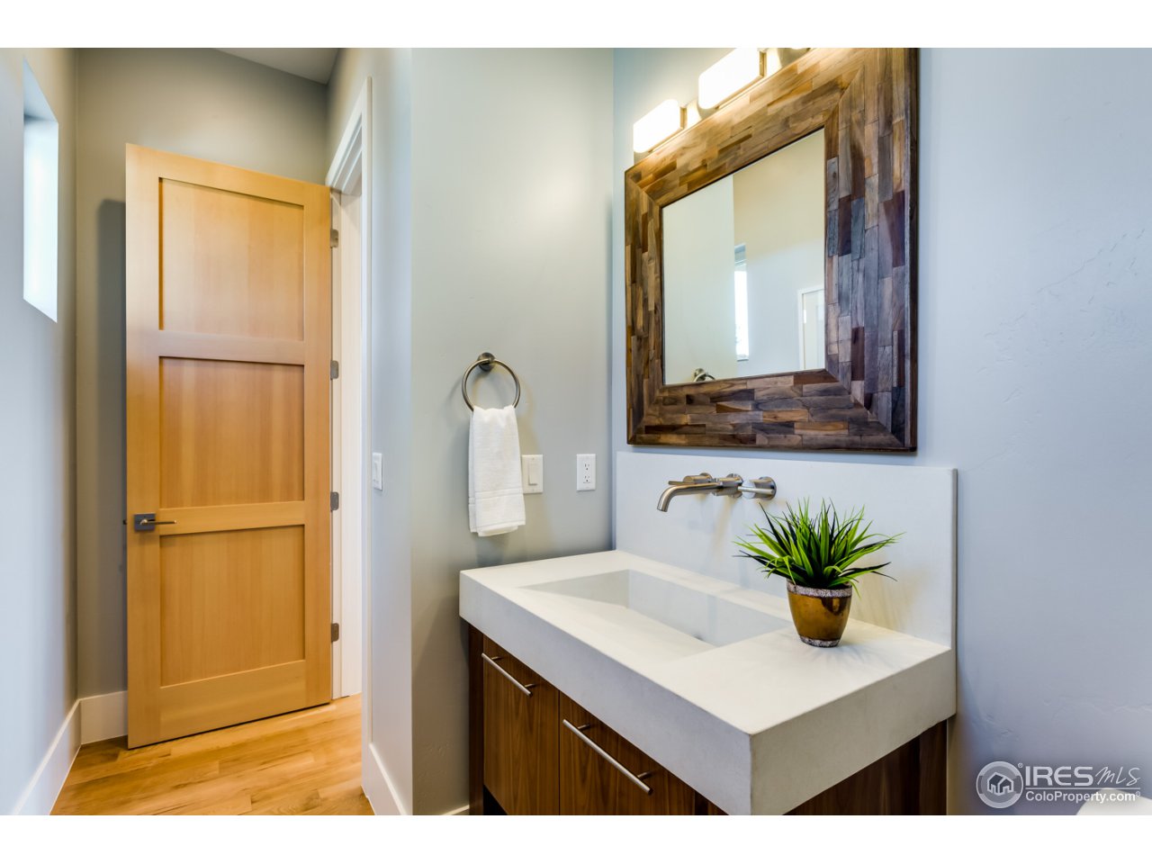 7412 Deerfield Road Longmont, CO 80503 - Photo 13 of 37 Powder Bath with Custom Built-in Vanity